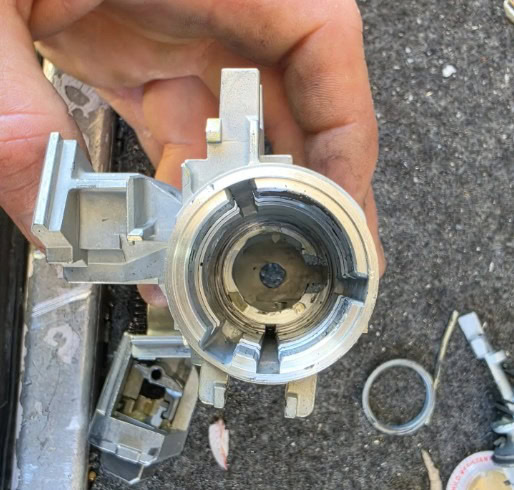 Broken Volkswagen ignition housing component causing jammed ignition barrel